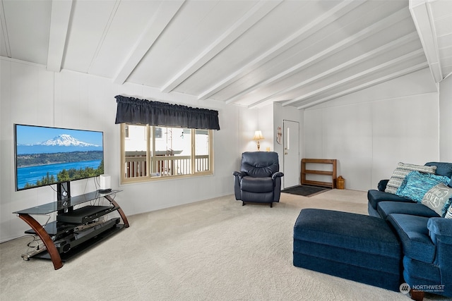 living room featuring vaulted ceiling with beams and carpet flooring