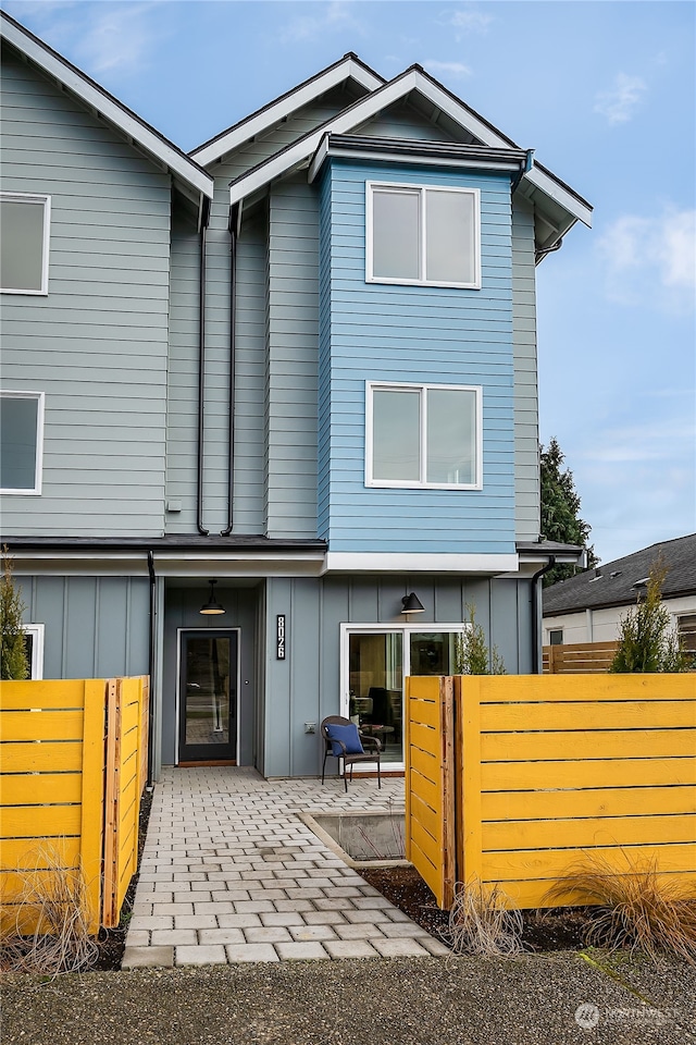 back of house with a patio