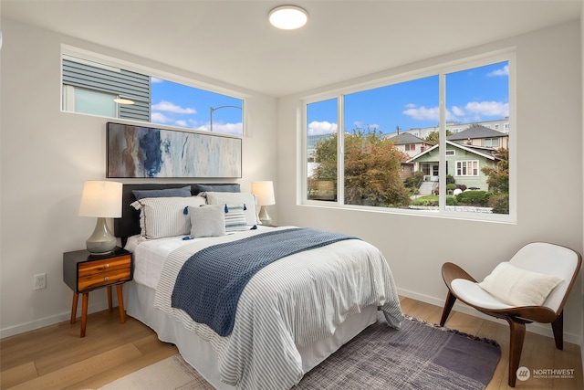 bedroom featuring hardwood / wood-style flooring