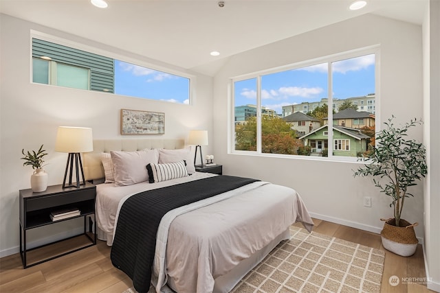 bedroom featuring light hardwood / wood-style floors