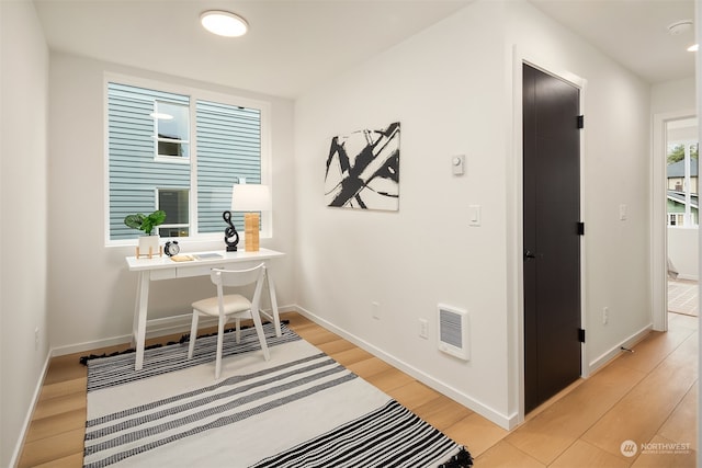 office area with light wood-type flooring