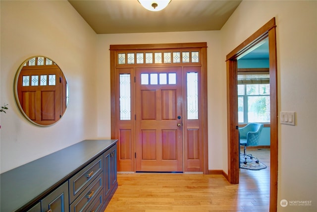 entryway with light hardwood / wood-style flooring