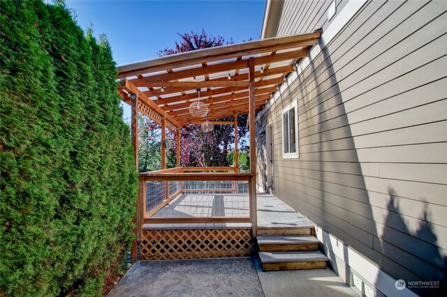 wooden terrace featuring a pergola