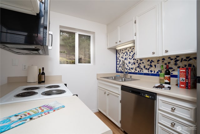 kitchen featuring light hardwood / wood-style flooring, white cabinets, sink, and stainless steel dishwasher