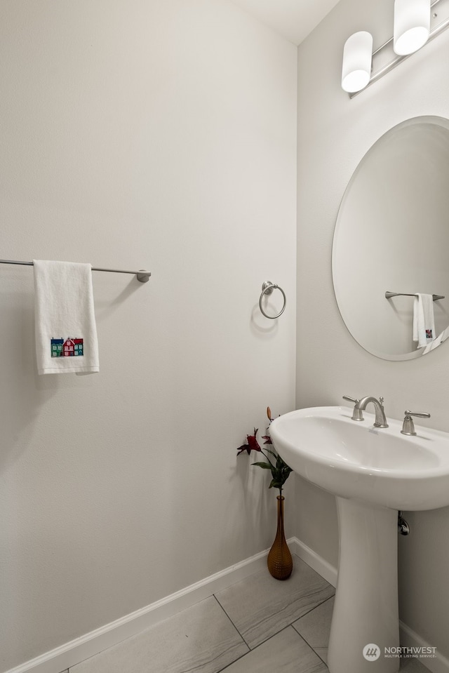 bathroom featuring tile patterned flooring