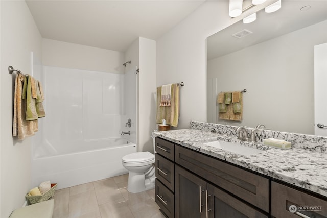 full bathroom with tile patterned flooring, vanity, shower / tub combination, and toilet