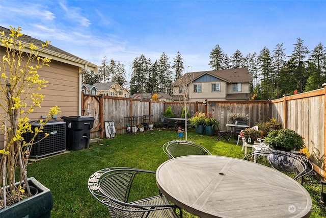 view of yard featuring central AC