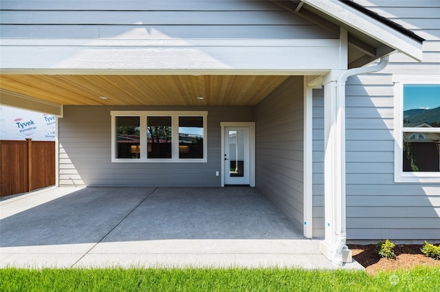 property entrance with a patio area