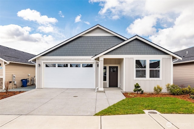 ranch-style home featuring a garage, driveway, and board and batten siding