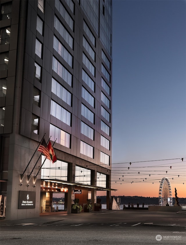 view of outdoor building at dusk