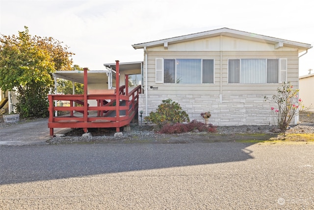 view of front facade with a deck