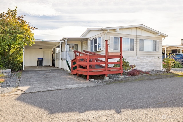 manufactured / mobile home with a carport