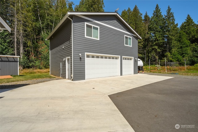 exterior space with a garage