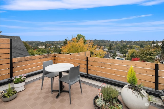 view of patio with a balcony