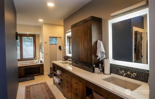 96 Forrest Rd, Sequim, WA 98382 - full bathroom featuring a bath, double vanity, tile patterned flooring, and tasteful backsplash