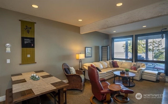 living room with beam ceiling