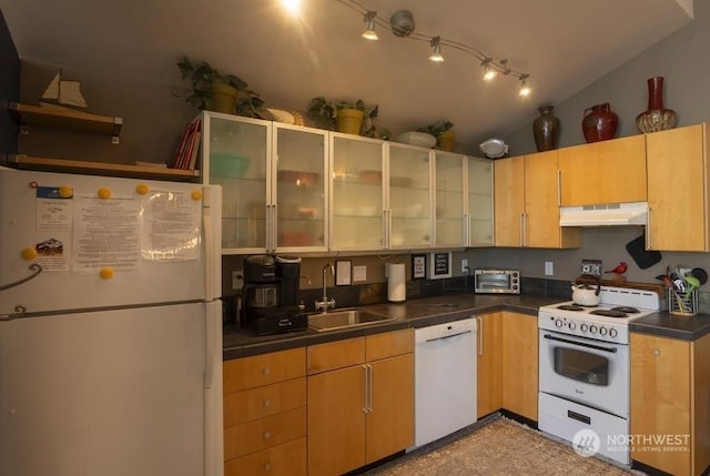 96 Forrest Rd, Sequim, WA 98382 - kitchen featuring white appliances, a sink, under cabinet range hood, dark countertops, and lofted ceiling