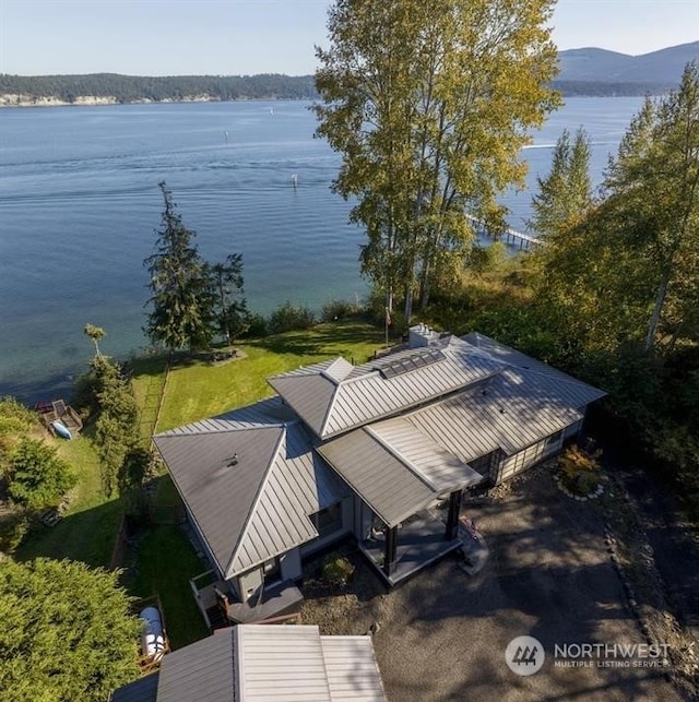 drone / aerial view featuring a water view