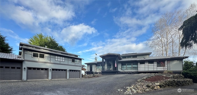 view of front of property with a garage