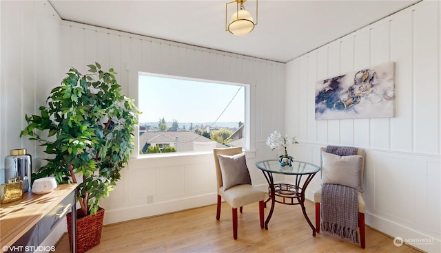 713 N Broadway St, Aberdeen, WA 98520 - living area with light wood-style floors and a decorative wall
