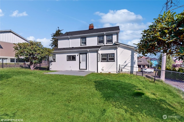 713 N Broadway St, Aberdeen, WA 98520 - view of front of home featuring a chimney, a fenced backyard, a patio area, and a front lawn