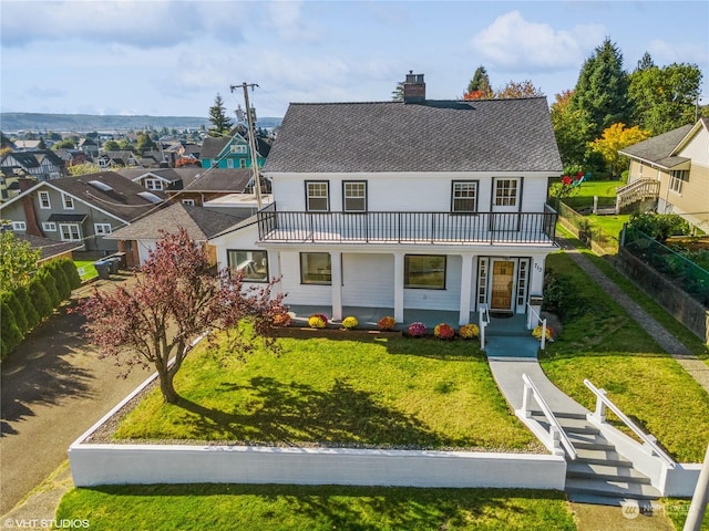 713 N Broadway St, Aberdeen, WA 98520 - view of front of home featuring a residential view, a chimney, roof with shingles, and a front lawn
