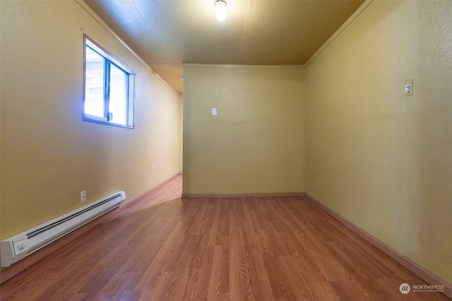 interior space featuring light wood-type flooring and a baseboard radiator