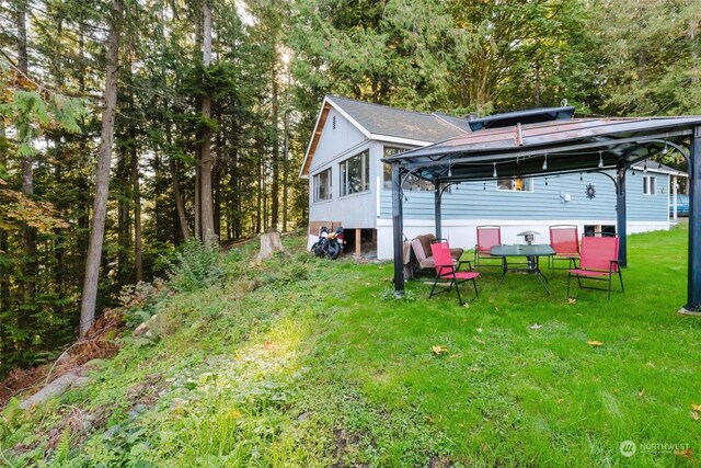 10012 Brush Arbor Ln NW, Seabeck, WA 98380 - back of house featuring a gazebo and a lawn
