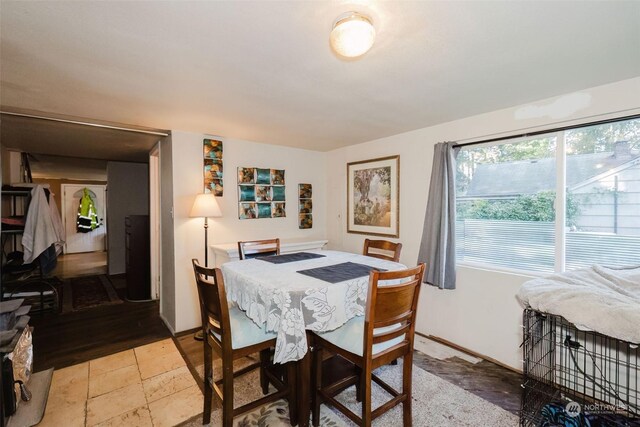 10012 Brush Arbor Ln NW, Seabeck, WA 98380 - dining area featuring stone tile flooring