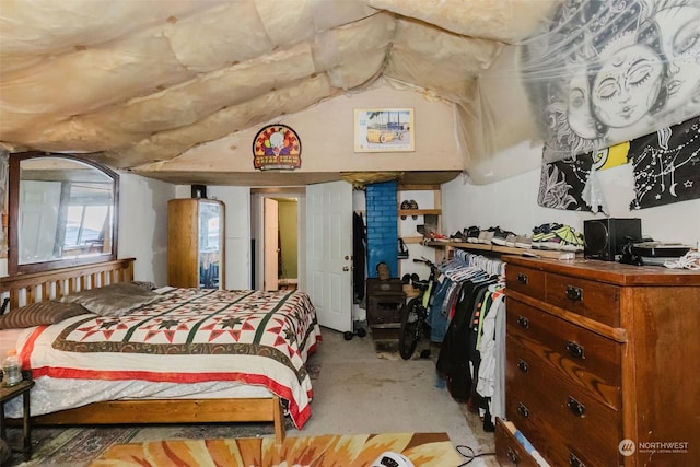 10012 Brush Arbor Ln NW, Seabeck, WA 98380 - bedroom featuring lofted ceiling and concrete floors