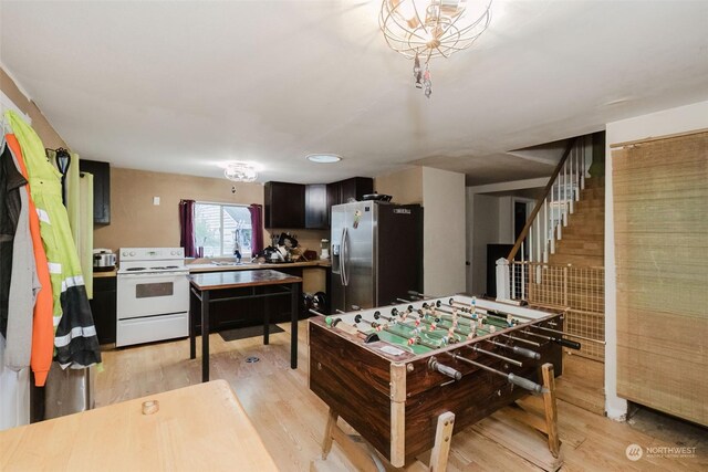 10012 Brush Arbor Ln NW, Seabeck, WA 98380 - game room featuring light wood-style flooring
