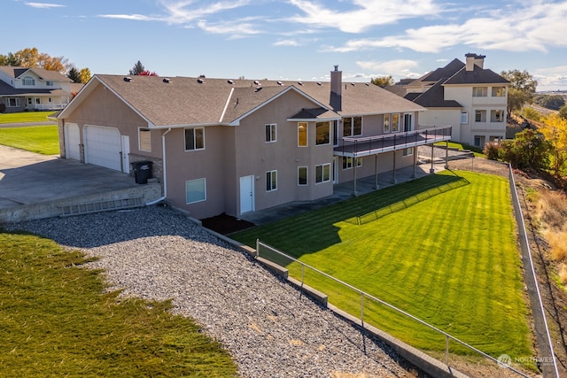 rear view of property featuring a yard