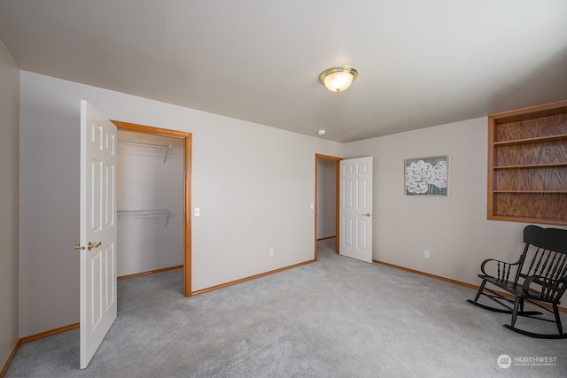 unfurnished room with light colored carpet