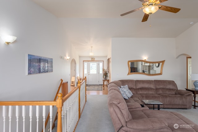 living room with ceiling fan and light hardwood / wood-style floors