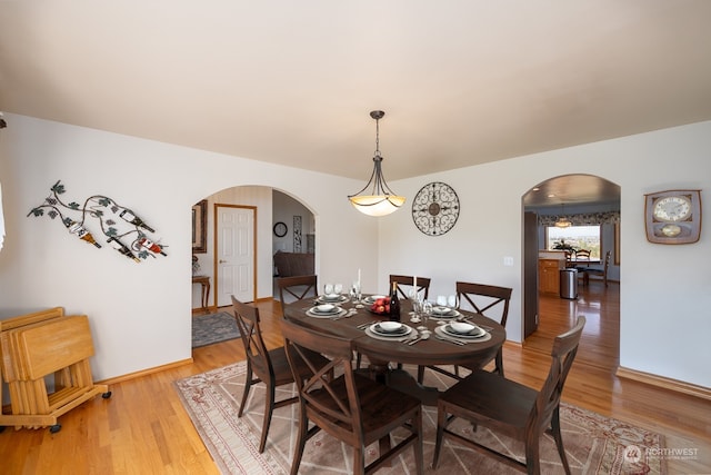 dining area featuring hardwood / wood-style floors