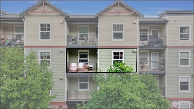 view of property with a balcony