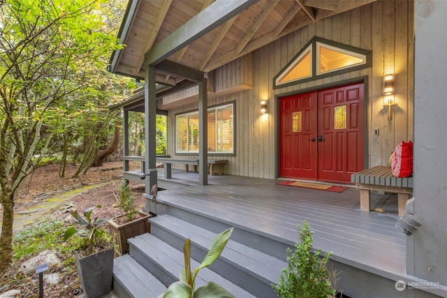 doorway to property featuring covered porch