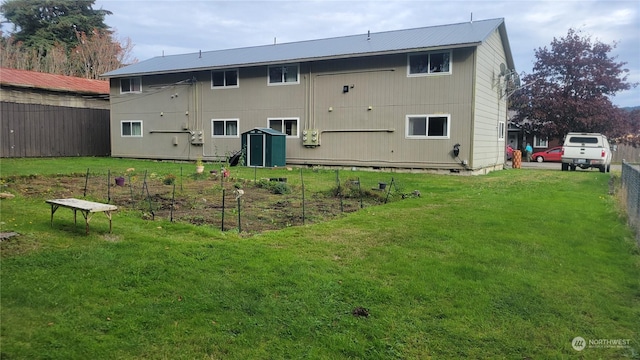 50 Ash Ave E, Forks, WA 98331 - rear view of property featuring a garden and crawl space