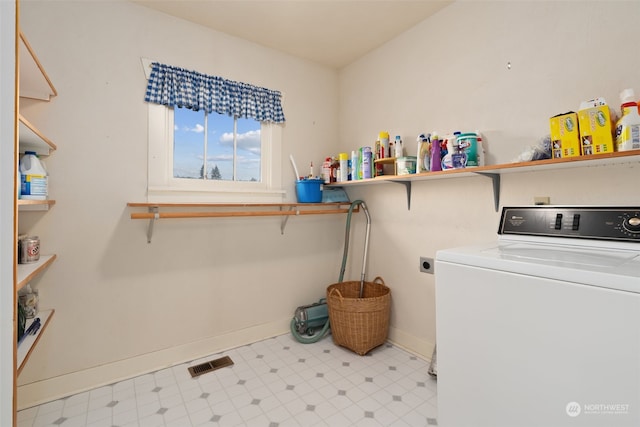 laundry room featuring washer / dryer