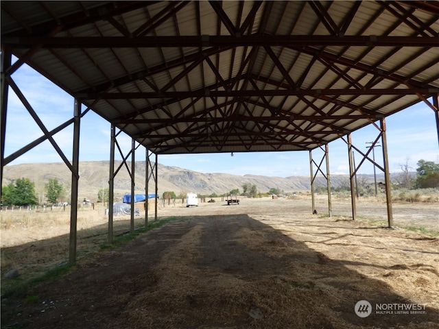 exterior space featuring a mountain view and a rural view