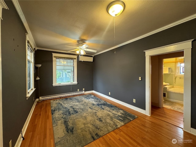 unfurnished bedroom with multiple windows, crown molding, a baseboard radiator, and dark hardwood / wood-style flooring