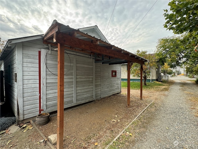 view of outdoor structure with a carport