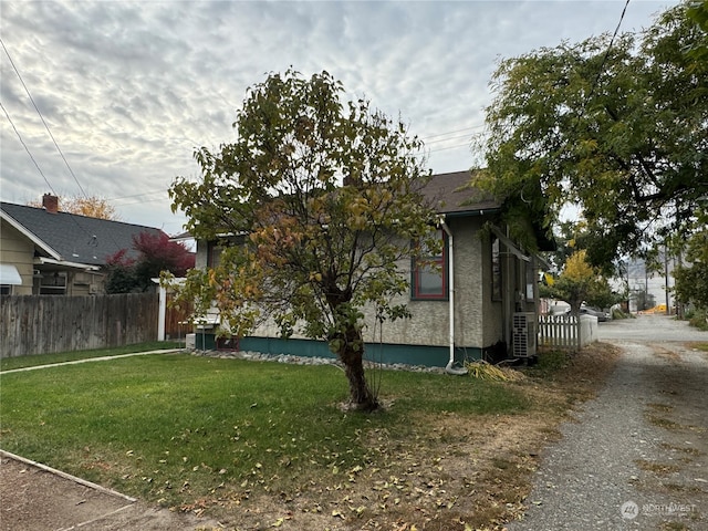 view of property exterior featuring a yard