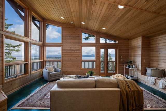 living room featuring wood ceiling, wood walls, high vaulted ceiling, and carpet flooring