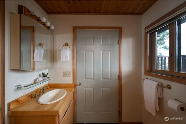 bathroom featuring vanity and wooden ceiling