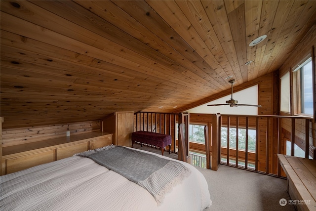 bedroom featuring carpet, multiple windows, wood ceiling, and vaulted ceiling