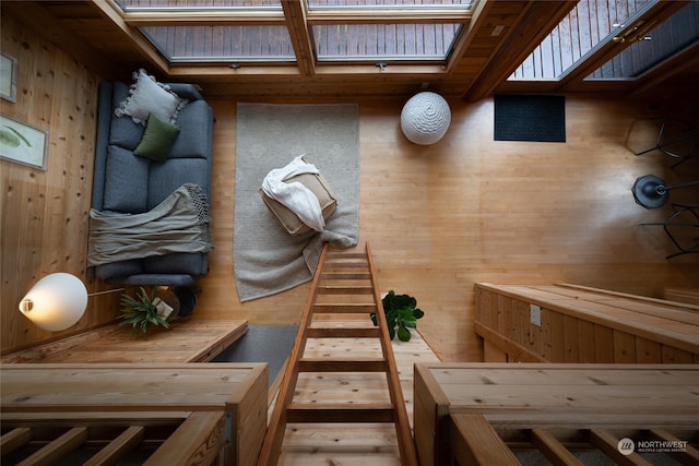 interior space featuring wood walls