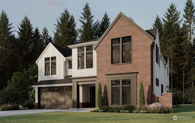 view of front facade with a garage and a front lawn