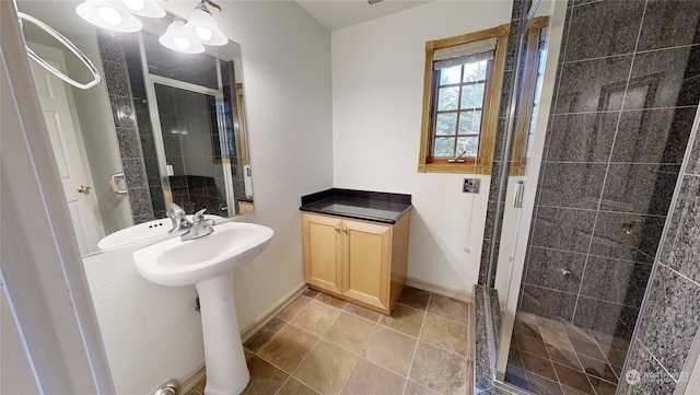 bathroom featuring walk in shower and sink