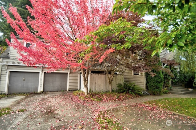 view of property exterior featuring a garage